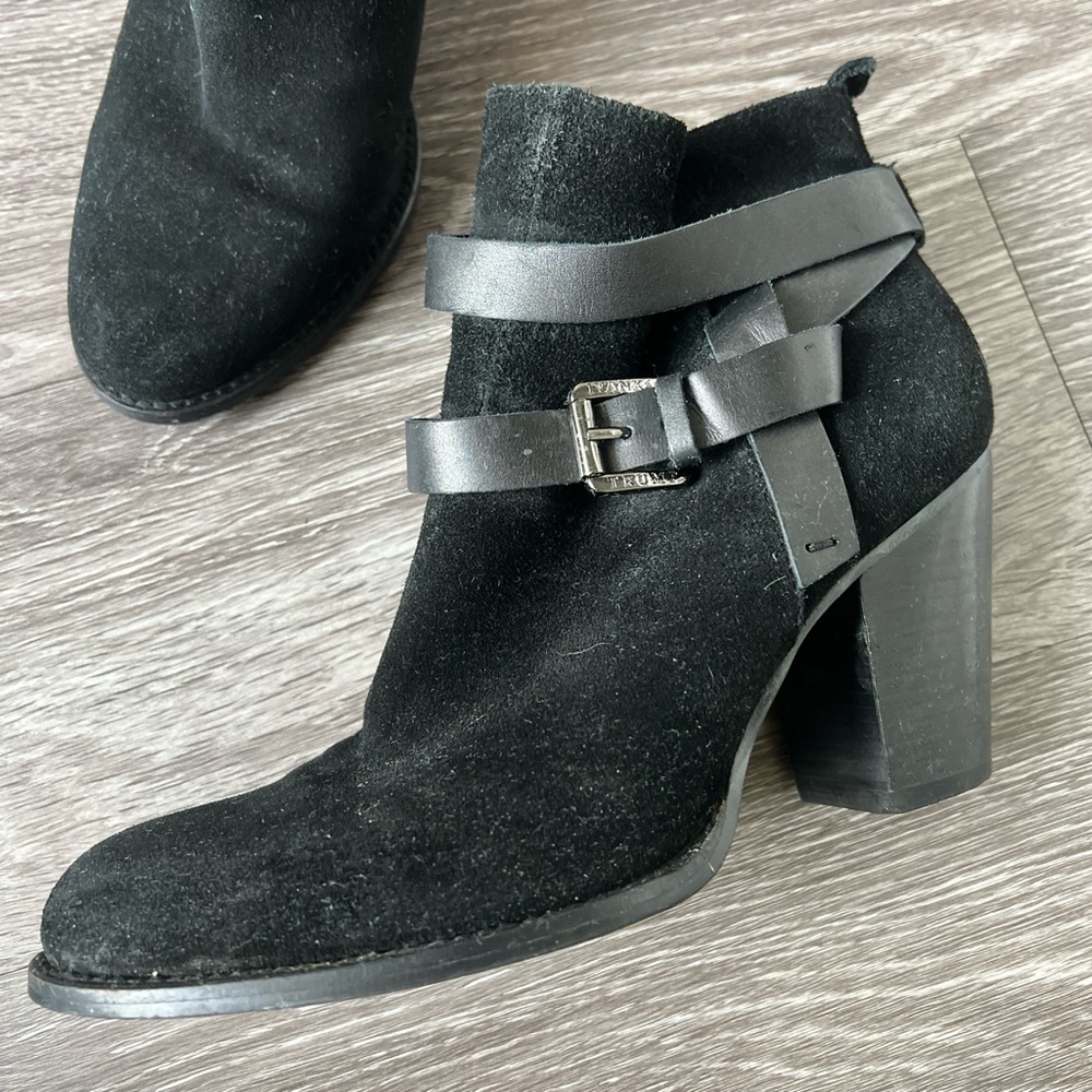 Black suede ankle boots w/ buckle detail